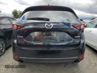 2020 Mazda CX-5 Grand Touring with VIN JM3KFADM0L0786565, listed as a Copart auction lot 48430915 with 60,390 mi miles and Salvage Title. Bid and sale history available at carsss.com. Image 6.