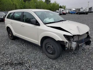 2015 Dodge Journey SE z VIN 3C4PDCABXFT595441, wystawiony jako Copart lot #59181825 z przebiegiem 122 263 mil mil oraz Szkoda całkowita • Salvage title. Historia ofert i sprzedaży dostępna na DreamBid. Obrazek 4.