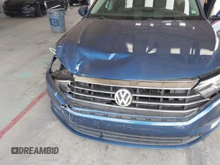 2019 Volkswagen Jetta S z VIN 3VWC57BU4KM005853, wystawiony jako IAAI lot #42183004 z przebiegiem 104 691 mil mil oraz . Historia ofert i sprzedaży dostępna na DreamBid. Obrazek 6.