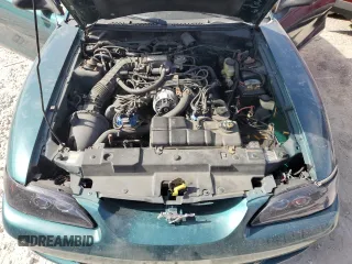 1998 Ford Mustang GT z VIN 1FAFP42X0WF255816, wystawiony jako Copart lot #55011425 z przebiegiem 144 397 mil mil oraz Czysty tytuł • Clean title. Historia ofert i sprzedaży dostępna na DreamBid. Obrazek 11.