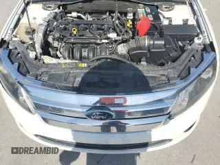2012 Ford Fusion SE z VIN 3FAHP0HA7CR133859, wystawiony jako Copart lot #61153125 z przebiegiem 100 822 mil mil oraz Czysty tytuł • Clean title. Historia ofert i sprzedaży dostępna na DreamBid. Obrazek 11.