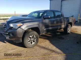 2018 Toyota Tacoma SR with VIN 5TFCZ5AN3JX139395, listed as a Copart auction lot 54355045 with 82,901 mi miles and Salvage title. Bid and sale history available at DreamBid. Image 1.