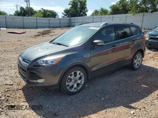 2016 Ford Escape Titanium z VIN 1FMCU9J94GUA97852, wystawiony jako Copart lot #61910455 z przebiegiem 72 847 mil mil oraz Szkoda całkowita • Salvage title. Historia ofert i sprzedaży dostępna na DreamBid. Obrazek 1.