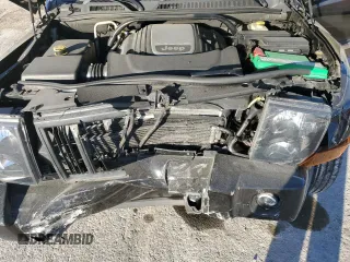 2007 Jeep Commander Overland with VIN 1J8HG68217C619277, listed as a Copart auction lot 82934414 with 136,282 mi miles and Salvage title. Bid and sale history available at DreamBid. Image 13.