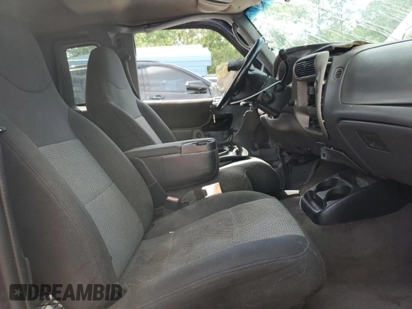 2003 Ford Ranger with VIN 1FTZR44V03PB03182, listed as a Copart auction lot 58736475 with 238,277 mi miles and Salvage title. Bid and sale history available at DreamBid. Image 7.