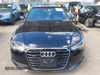 2014 Audi A6 2.0T Premium Plus with VIN WAUGFAFC7EN028549, listed as a IAAI auction lot 41948470 with 141,557 mi miles. Bid and sale history available at carsss.com. Image 12.