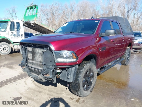 2016 Ram 2500 Laramie with VIN 3C6UR5FL7GG368646, listed as a IAAI auction lot 41649574 with 302,360 mi miles. Bid and sale history available at carsss.com. Image 2.