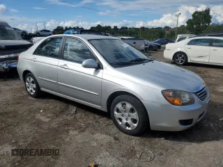 2009 Kia Spectra EX with VIN KNAFE221695615873, listed as a Copart auction lot 67671454 with 135,300 mi miles and Salvage Title. Bid and sale history available at carsss.com. Image 4.