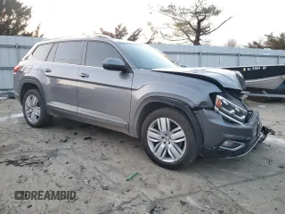 2019 Volkswagen Atlas SEL with VIN 1V2MR2CA5KC611651, listed as a Copart auction lot 86368654 with 54,066 mi miles and Salvage title. Bid and sale history available at DreamBid. Image 4.