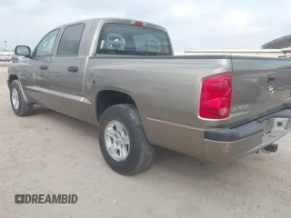 2006 Dodge Dakota SLT with VIN 1D7HE48N16S703072, listed as a IAAI auction lot 42156709 with 102,919 mi miles. Bid and sale history available at carsss.com. Image 3.