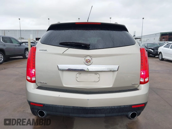 2015 Cadillac SRX z VIN 3GYFNAE37FS597695, wystawiony jako IAAI lot #42184666 z przebiegiem 106 210 mil mil oraz . Historia ofert i sprzedaży dostępna na DreamBid. Obrazek 16.