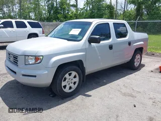 2008 Honda Ridgeline RT with VIN 2HJYK16228H524622, listed as a IAAI auction lot 42445595 with 209,649 mi miles and . Bid and sale history available at DreamBid. Image 2.