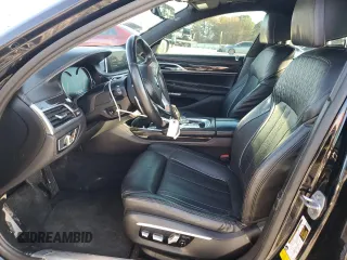 2016 BMW 7 Series 750i with VIN WBA7F0C5XGGL99048, listed as a Copart auction lot 84815364 with 96,743 mi miles and Salvage Title. Bid and sale history available at carsss.com. Image 7.