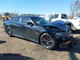 2019 Dodge Charger Scat Pack z VIN 2C3CDXGJ3KH740055, wystawiony jako IAAI lot #41736718 z przebiegiem 68 934 mil mil oraz . Historia ofert i sprzedaży dostępna na DreamBid. Obrazek 13.