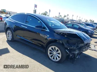 2019 Tesla Model X 75D with VIN 5YJXCAE29KF186356, listed as a IAAI auction lot 40922632 with 56,765 mi miles. Bid and sale history available at carsss.com. Image 1.