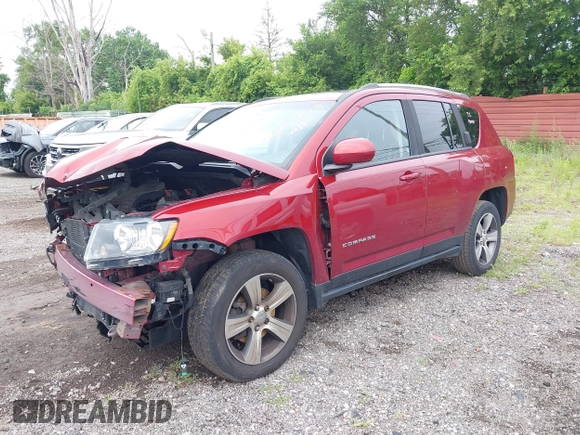 2016 Jeep Compass Latitude with VIN 1C4NJCEA3GD766040, listed as a IAAI auction lot 42667808 with 96,787 mi miles and . Bid and sale history available at DreamBid. Image 2.