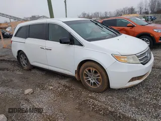 2012 Honda Odyssey EX z VIN 5FNRL5H46CB068277, wystawiony jako IAAI lot #40902230 z przebiegiem 188 012 mil mil oraz . Historia ofert i sprzedaży dostępna na DreamBid. Obrazek 1.