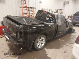 2014 Ram 1500 with VIN 3C6JR7CT6EG333032, listed as a IAAI auction lot 41322701 with 102,750 mi miles and . Bid and sale history available at DreamBid. Image 4.