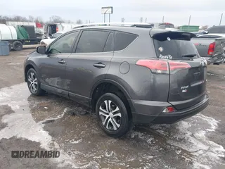 2016 Toyota RAV4 LE with VIN JTMZFREV5GJ093472, listed as a IAAI auction lot 41332037 with 212,869 mi miles. Bid and sale history available at carsss.com. Image 3.