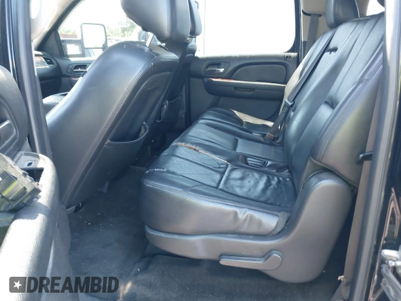 2014 Chevrolet Suburban LT z VIN 1GNSCJE02ER116017, wystawiony jako IAAI lot #42308074 z przebiegiem 228 365 mil mil oraz . Historia ofert i sprzedaży dostępna na DreamBid. Obrazek 8.