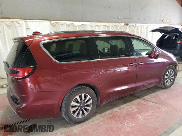 2021 Chrysler Pacifica Hybrid Touring L with VIN 2C4RC1L77MR596250, listed as a Copart auction lot 52892595 with 114,876 mi miles and Salvage title. Bid and sale history available at DreamBid. Image 3.