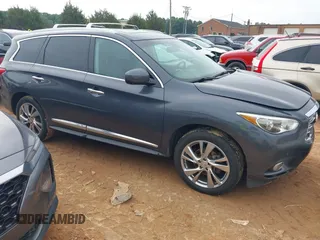 2013 Infiniti JX35 z VIN 5N1AL0MM2DC313818, wystawiony jako IAAI lot #42347174 z przebiegiem 133 488 mil mil oraz . Historia ofert i sprzedaży dostępna na DreamBid. Obrazek 1.