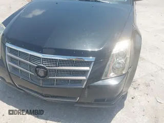 2009 Cadillac CTS RWD z VIN 1G6DF577190151588, wystawiony jako IAAI lot #42307738 z przebiegiem 185 441 mil mil oraz . Historia ofert i sprzedaży dostępna na DreamBid. Obrazek 12.