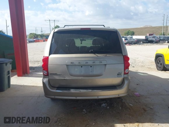 2014 Dodge Grand Caravan SXT with VIN 2C4RDGCG8ER244201, listed as a IAAI auction lot 42017091 with 161,653 mi miles and . Bid and sale history available at DreamBid. Image 17.