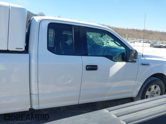 2018 Ford F-150 XL z VIN 1FTFX1C57JKF08037, wystawiony jako IAAI lot #41683537 z przebiegiem 195 633 mil mil oraz . Historia ofert i sprzedaży dostępna na DreamBid. Obrazek 13.