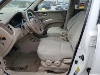 2005 Kia Sportage LX with VIN KNDJF723057125954, listed as a Copart auction lot 79454554 with 179,811 mi miles and Salvage Title. Bid and sale history available at carsss.com. Image 7.