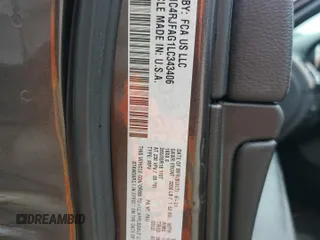 2020 Jeep Grand Cherokee Laredo E with VIN 1C4RJFAG1LC343406, listed as a Copart auction lot 60645785 with 51,831 mi miles and Salvage title. Bid and sale history available at DreamBid. Image 13.