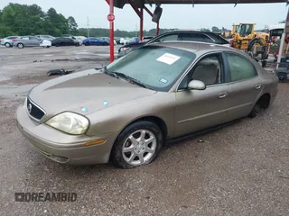 2002 Mercury Sable GS z VIN 1MEFM50U82A647899, wystawiony jako IAAI lot #42193511 z przebiegiem 130 254 mil mil oraz . Historia ofert i sprzedaży dostępna na DreamBid. Obrazek 2.