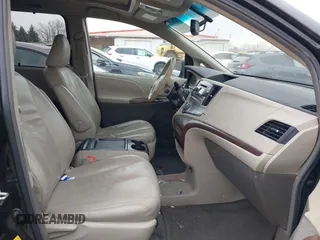 2011 Toyota Sienna XLE AAS with VIN 5TDYK3DC9BS071636, listed as a IAAI auction lot 41972332 with 204,477 mi miles and . Bid and sale history available at DreamBid. Image 5.