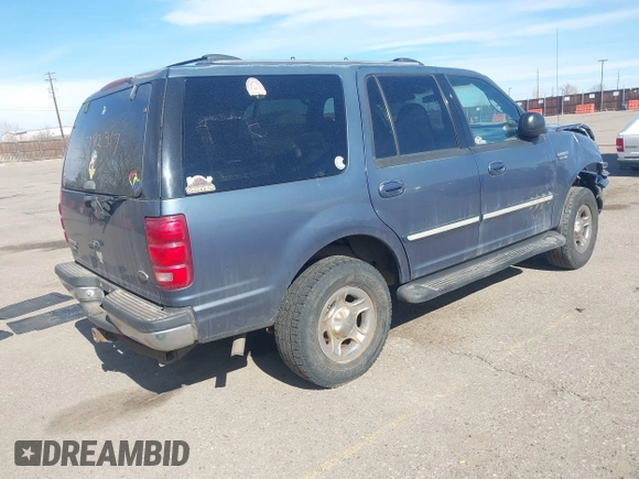 1999 Ford Expedition XLT z VIN 1FMPU18L2XLB43236, wystawiony jako IAAI lot #41792317 z przebiegiem 157 636 mil mil oraz . Historia ofert i sprzedaży dostępna na DreamBid. Obrazek 4.