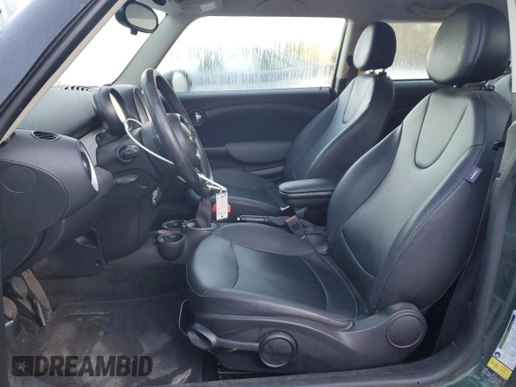 2011 MINI Hardtop with VIN WMWSU3C57BTX97173, listed as a Copart auction lot 50369155 with 122,713 mi miles and Salvage Title. Bid and sale history available at DreamBid. Image 7.