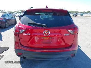 2015 Mazda CX-5 Touring with VIN JM3KE2CY5F0542184, listed as a IAAI auction lot 41770264 with 119,592 mi miles. Bid and sale history available at carsss.com. Image 16.
