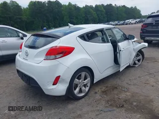 2012 Hyundai Veloster w/Gray Int с VIN KMHTC6AD6CU026944, выставлен на аукционе IAAI как лот 42216988 с пробегом 61 147 миль миль и . История ставок и продаж доступна на DreamBid. Изображение 4.