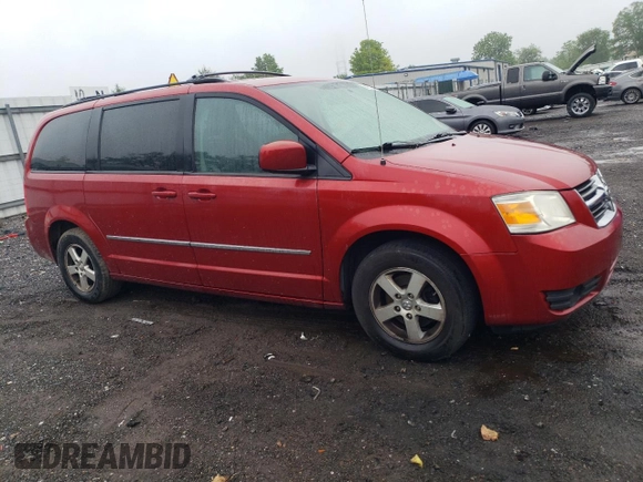 2010 Dodge Grand Caravan SXT z VIN 2D4RN5D10AR179773, wystawiony jako Copart lot #56855235 z przebiegiem 239 925 mil mil oraz Nie do naprawy • Non repairable. Historia ofert i sprzedaży dostępna na DreamBid. Obrazek 4.