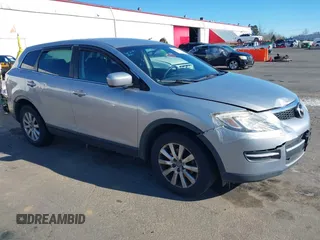 2007 Mazda CX-9 Grand Touring z VIN JM3TB28Y970103884, wystawiony jako IAAI lot #41502977 z przebiegiem 169 908 mil mil oraz . Historia ofert i sprzedaży dostępna na DreamBid. Obrazek 1.