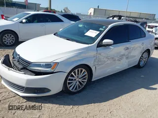 2013 Volkswagen Jetta TDI w/Premium/Nav with VIN 3VWLL7AJXDM392313, listed as a IAAI auction lot 42370151 with 98,618 mi miles and . Bid and sale history available at DreamBid. Image 2.