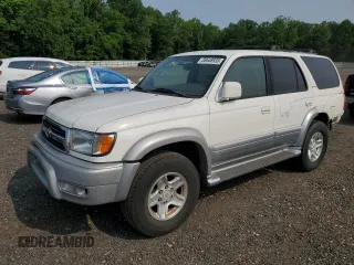 1999 Toyota 4Runner Limited z VIN JT3GN87R6X0098906, wystawiony jako Copart lot #58648935 z przebiegiem 194 869 mil mil oraz Szkoda całkowita • Salvage title. Historia ofert i sprzedaży dostępna na DreamBid. Obrazek 1.
