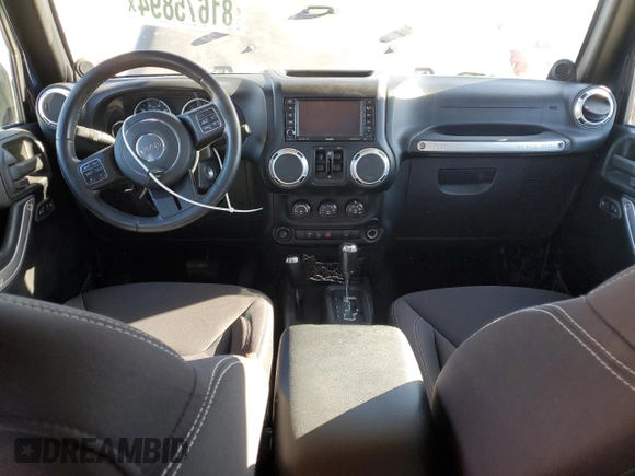 2013 Jeep Wrangler Unlimited Rubicon 10th Anniversary с VIN 1C4HJWFG7DL559539, выставлен на аукционе Copart как лот 81675894 с пробегом 99 425 миль миль и Списание • Salvage title. История ставок и продаж доступна на DreamBid. Изображение 8.