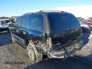 2002 GMC Yukon SLT with VIN 1GKEC13Z42J245768, listed as a IAAI auction lot 41769081 with 389,189 mi miles. Bid and sale history available at carsss.com. Image 6.