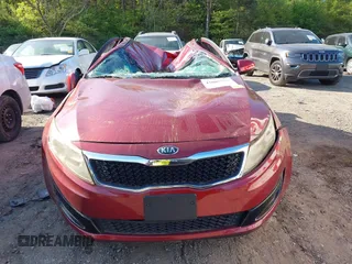 2013 Kia Optima LX z VIN 5XXGM4A76DG152178, wystawiony jako IAAI lot #42002201 z przebiegiem 72 335 mil mil oraz . Historia ofert i sprzedaży dostępna na DreamBid. Obrazek 12.