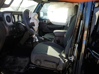 2024 Jeep Wrangler Sport S with VIN 1C4PJXDG0RW260789, listed as a Copart auction lot 49603305 with 4,125 mi miles and Salvage Title. Bid and sale history available at DreamBid. Image 7.