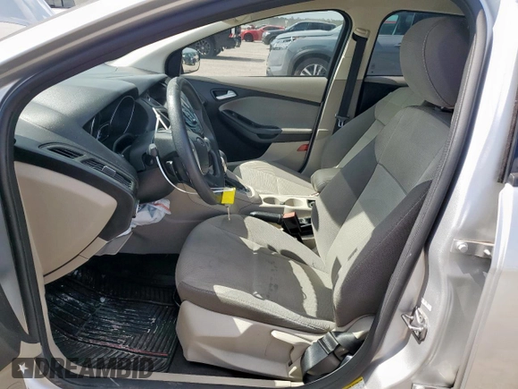 2013 Ford Focus SE with VIN 1FADP3F22DL263124, listed as a Copart auction lot 61583795 with 133,522 mi miles and Salvage title. Bid and sale history available at DreamBid. Image 7.