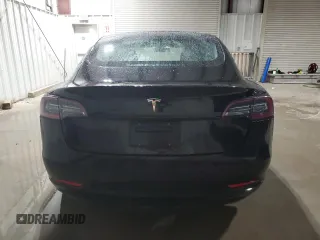 2023 Tesla Model 3 z VIN 5YJ3E1EA1PF452122, wystawiony jako Copart lot #63576995 z przebiegiem 104 907 mil mil oraz Czysty tytuł • Clean title. Historia ofert i sprzedaży dostępna na DreamBid. Obrazek 6.