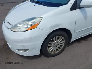 2010 Toyota Sienna XLE with VIN 5TDYK4CC7AS291119, listed as a IAAI auction lot 41742917 with 201,590 mi miles. Bid and sale history available at carsss.com. Image 6.