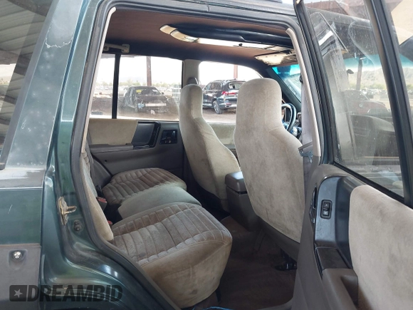 1994 Jeep Grand Cherokee Laredo with VIN 1J4GZ58S4RC280650, listed as a IAAI auction lot 42041261 with 199,265 mi miles and . Bid and sale history available at DreamBid. Image 8.
