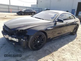 2013 BMW 6 Series 640i with VIN WBA6A0C52DDZ03809, listed as a Copart auction lot 84518974 with 84,147 mi miles and Salvage Title. Bid and sale history available at DreamBid. Image 1.